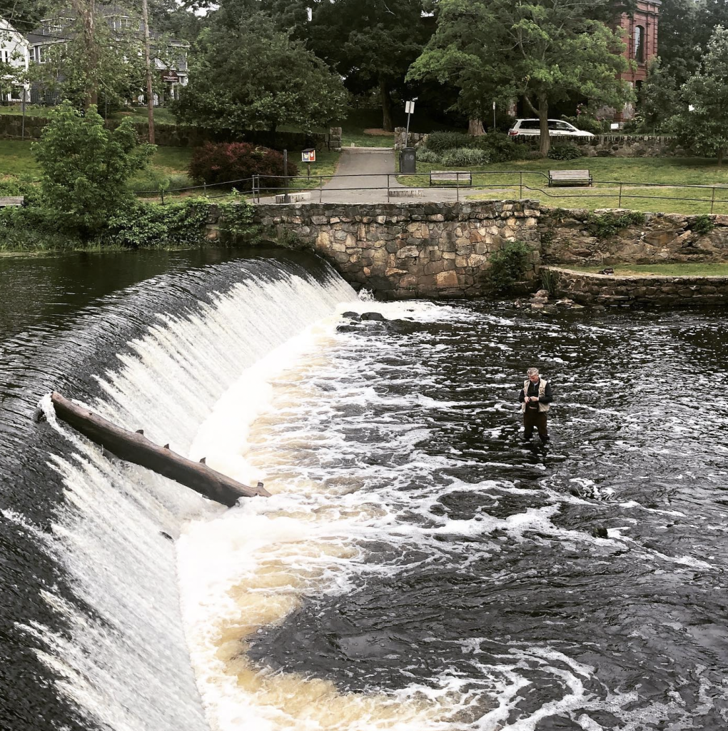 south natick dam log fisherman