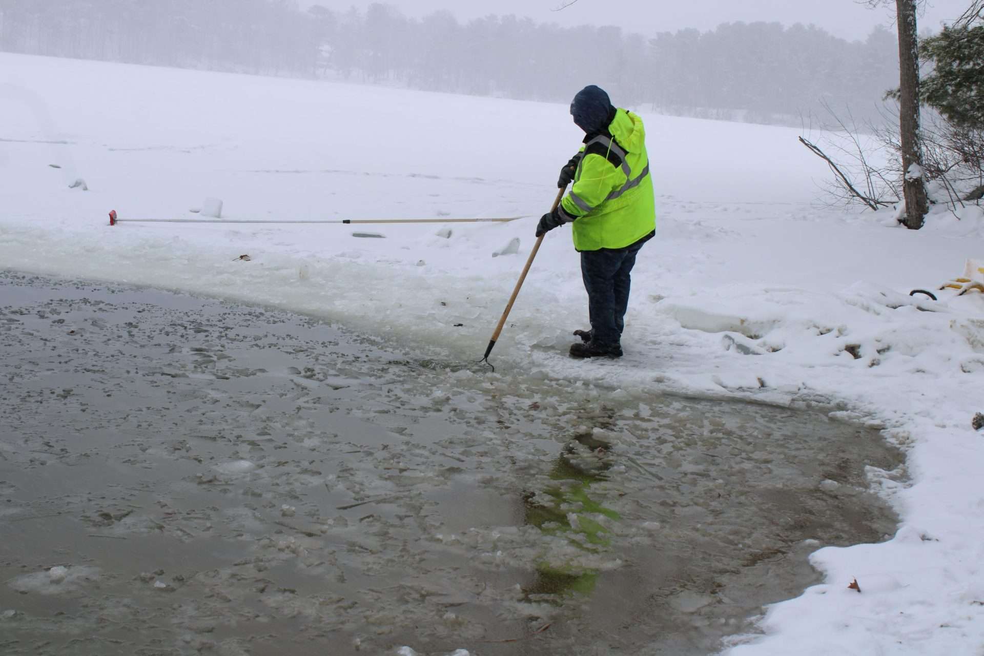 Volunteers spent the morning of Feb. 7 keeping the Passion Plunge area at the AMVETS Post 79free of ice.