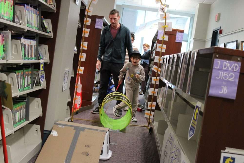 Hundreds of adults and children enjoyed a round of mini-golf during the Morse Institute Library’s annual Family Fun Day on March 7.