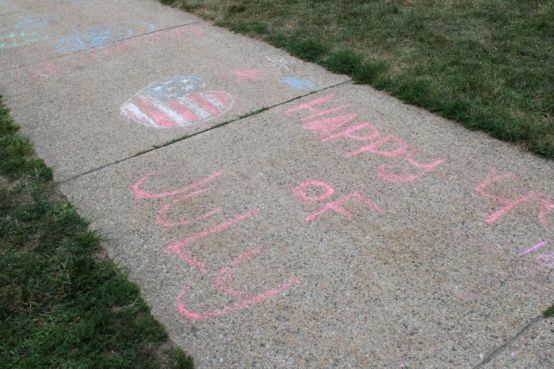 Some patriotic greetings on the Common’s sidewalks during the Friends of the Fourth’s Family Picnic on July 4.
