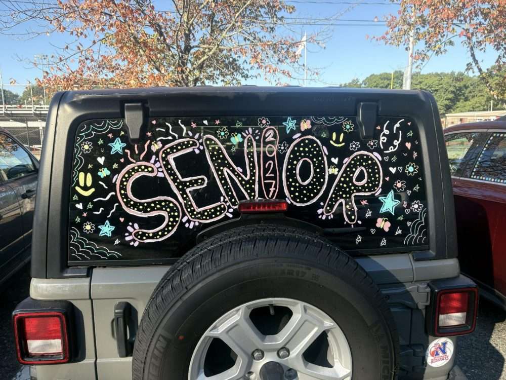 NHS senior cars at Memorial Field lot
