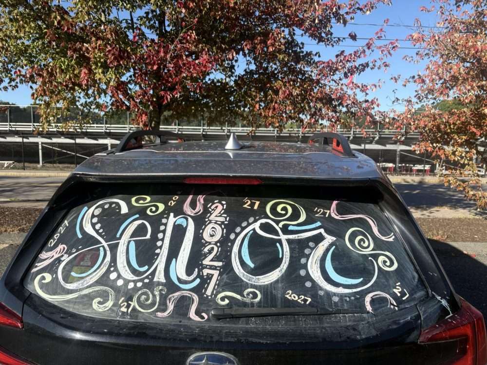 NHS senior cars at Memorial Field lot