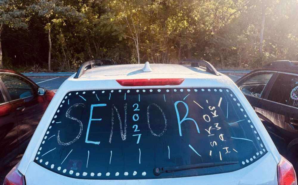 NHS senior cars at Memorial Field lot